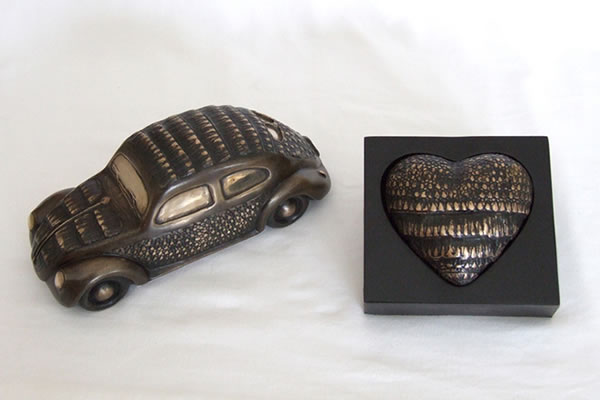 Armoured Car and Heart - bronze sculpture by Irish artist Marie Smith