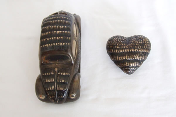 Armoured Car and Heart - bronze sculpture by Irish artist Marie Smith