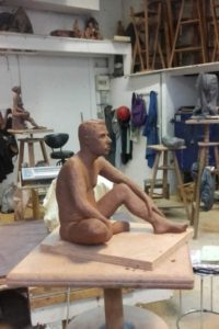 Male figure in clay at Atelier Saint Fargeau Paris by Irish artist Marie Smith
