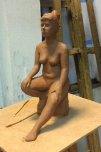 Nude clay female figure by artist Marie Smith